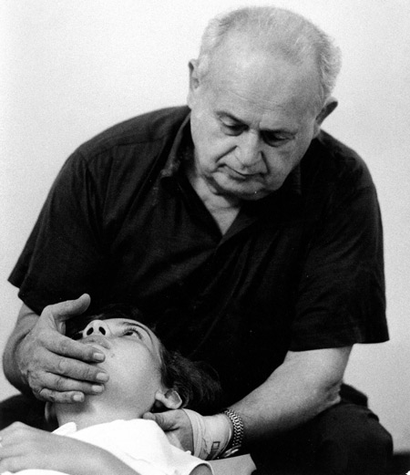Moshe Feldenkrais working with a child